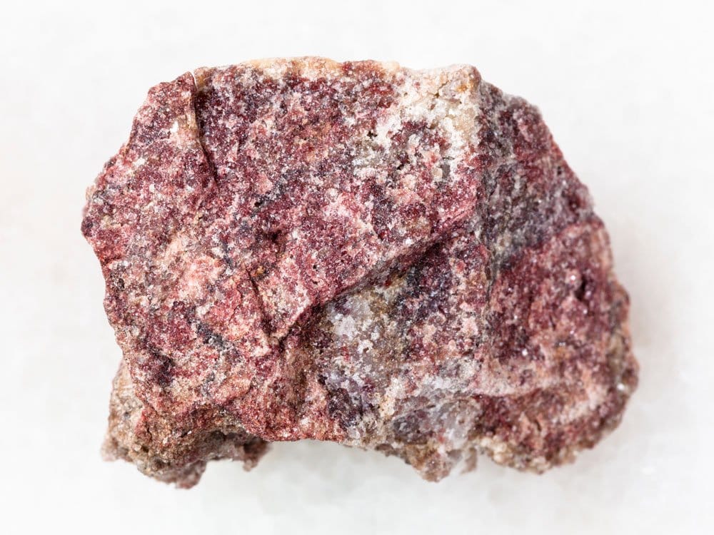 Dolomite — cristallisation rhomboédrique CaMg(CO₃)₂, teinte rose pâle due aux traces de manganèse