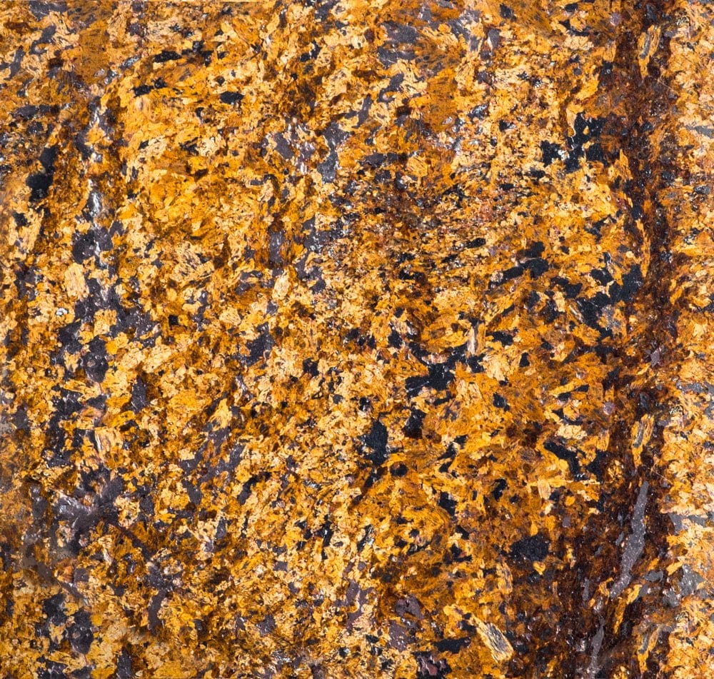 Pierre bronzite polie aux reflets dorés et bronzés — histoire de l'enstatite protectrice des Romains à la lithothérapie moderne