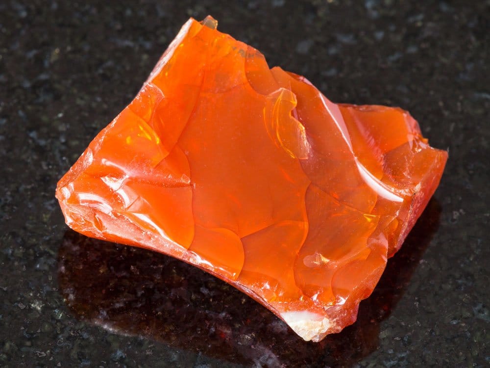 Opale de feu polée - vertus de passion, créativité et transformation en lithothérapie