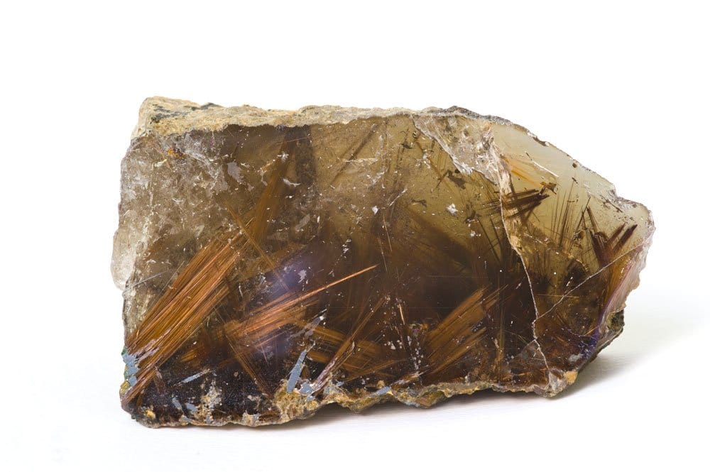 Cristal de quartz rutile poli montrant les inclusions de rutile dorées en réseau — origine Brésil Minas Gerais