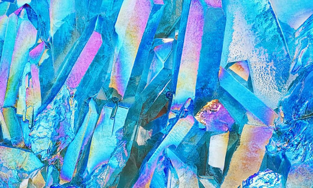 Pierre Aqua Aura bleu électrique — histoire moderne dépôt or vacuum chambre 871°C, légende atlantéenne