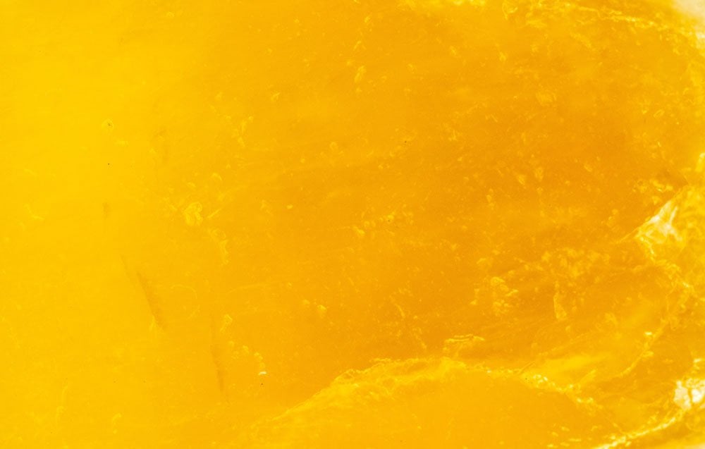 Pierre calcite jaune brute aux reflets dorés — histoire et origines de la calcite jaune en lithothérapie