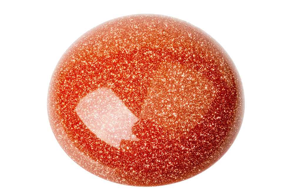 Vertus et propriétés de la pierre Goldstone — verre scintillant doré en lithothérapie