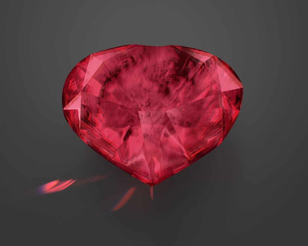 Béryl rouge poli facetté - passion courage chakra cœur racine lithothérapie