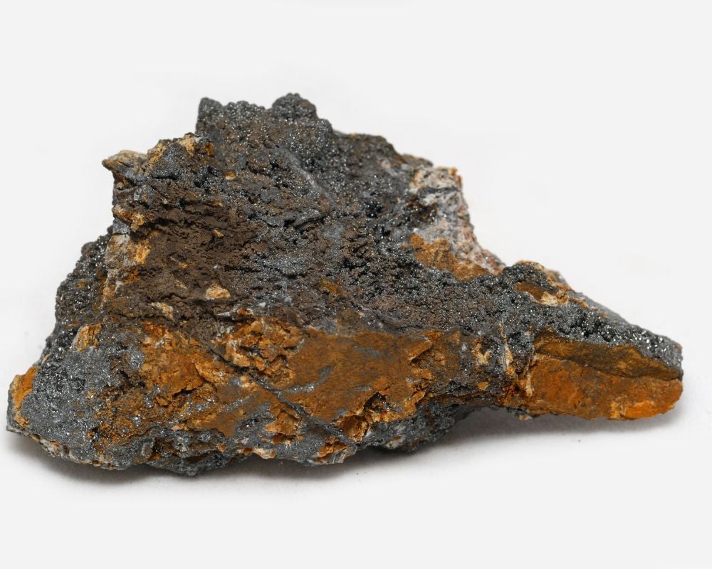Pyrolusite pierre noire : vertus énergétiques ancrage racine